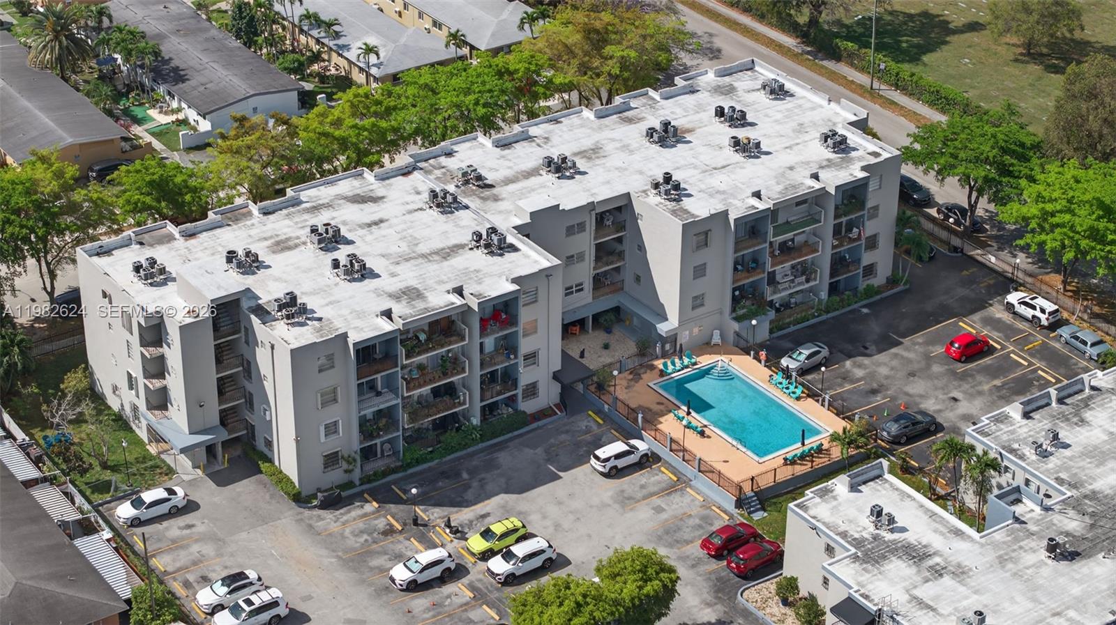 3181 Southwest 13th Street, Unit 416 Miami, FL 33145 - Photo 39 of 40 an aerial view of a house with a yard