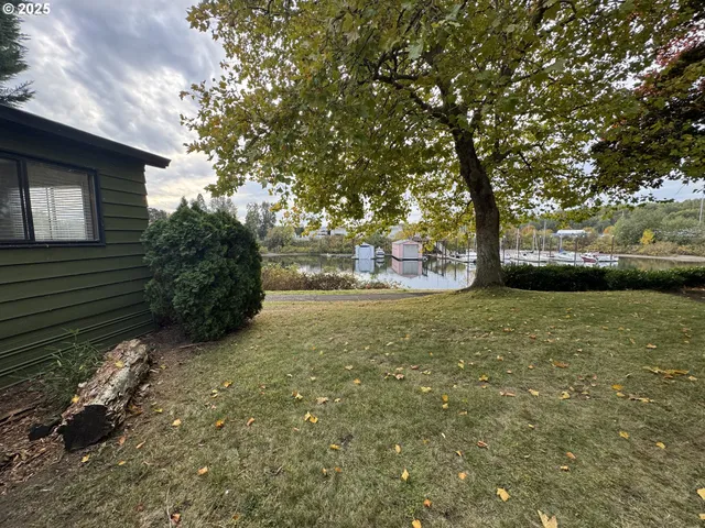 a utility room with a sink and glass windows