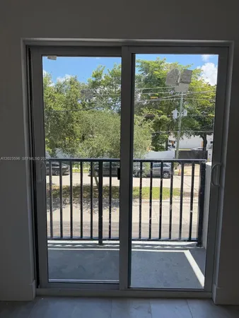 a view of porch with a floor to ceiling window