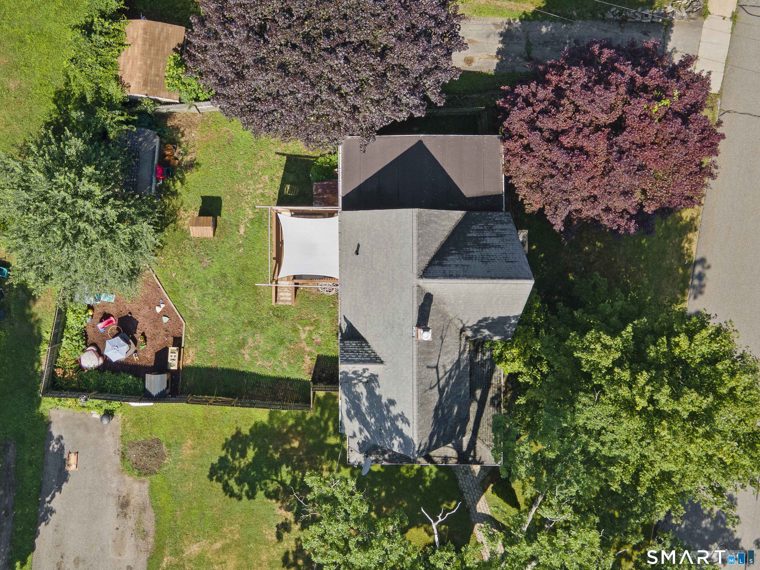 47 Broad Street Killingly, CT 06239 - Photo 33 of 33 an aerial view of a house with a yard and garden