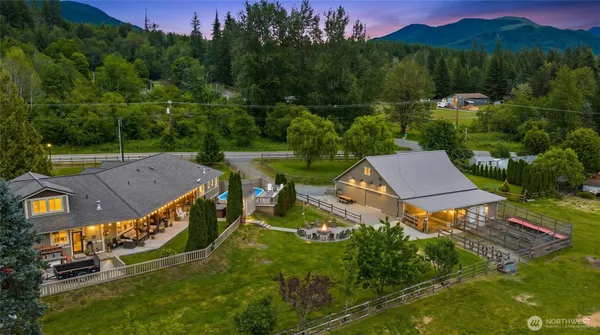 an aerial view of a house with a garden