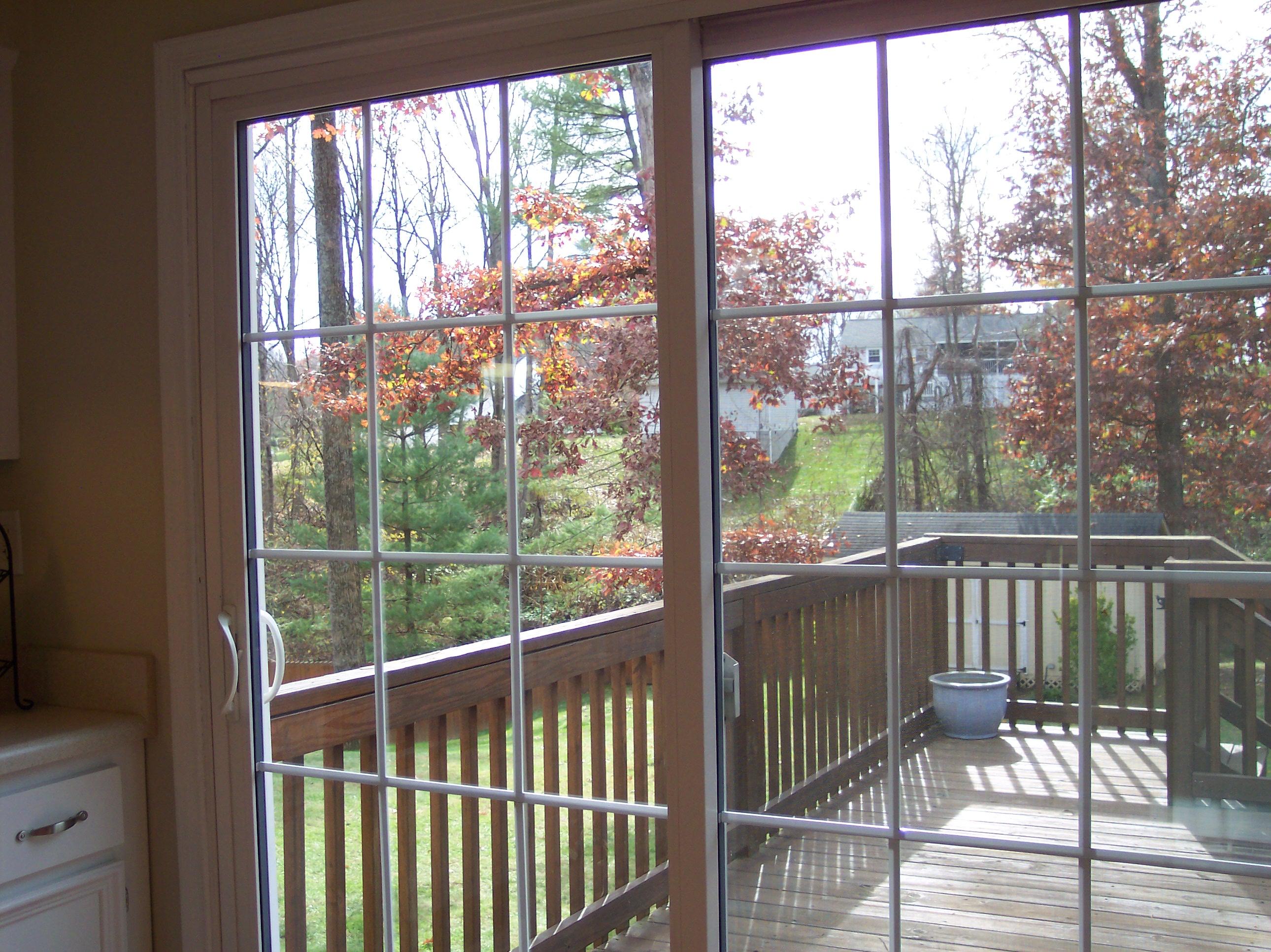 289 Scalybark Drive Blue Ridge, VA 24064 - Photo 15 of 73 a view of a balcony with floor to ceiling windows with wooden floor