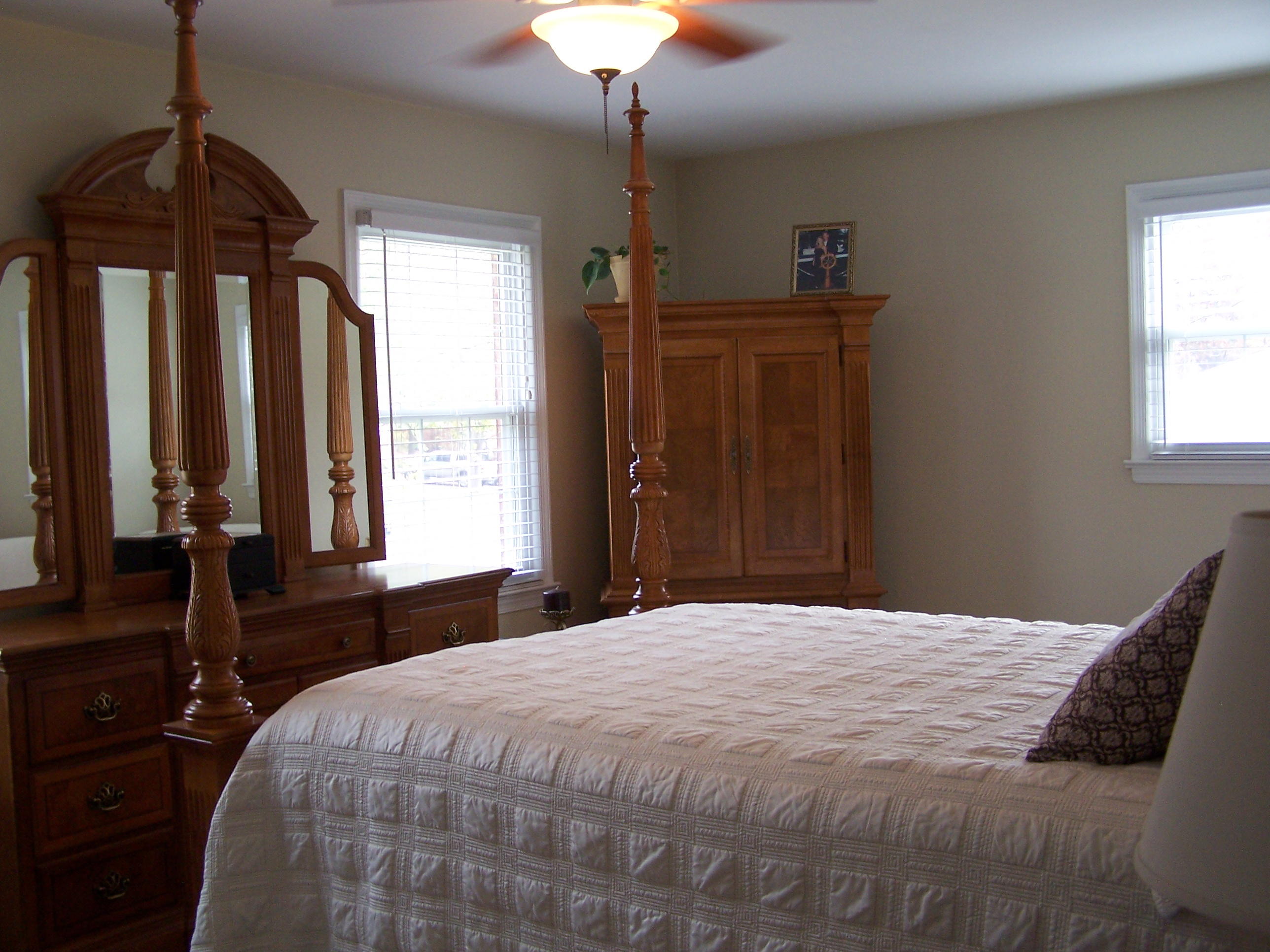 289 Scalybark Drive Blue Ridge, VA 24064 - Photo 20 of 73 a bedroom with a bed and a chandelier