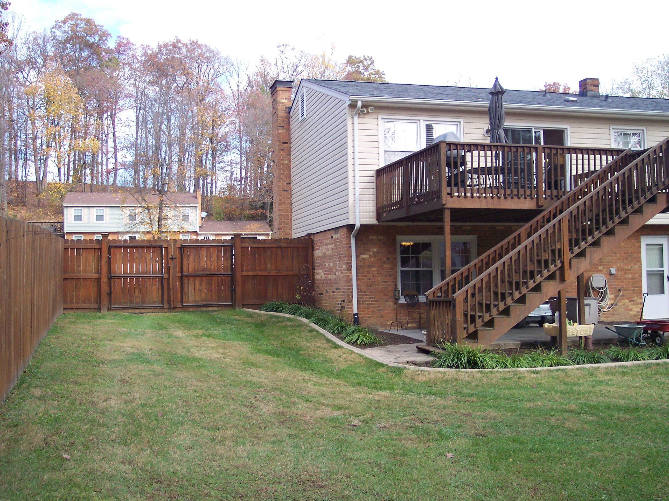 289 Scalybark Drive Blue Ridge, VA 24064 - Photo 49 of 73 a view of a house with wooden deck and a backyard