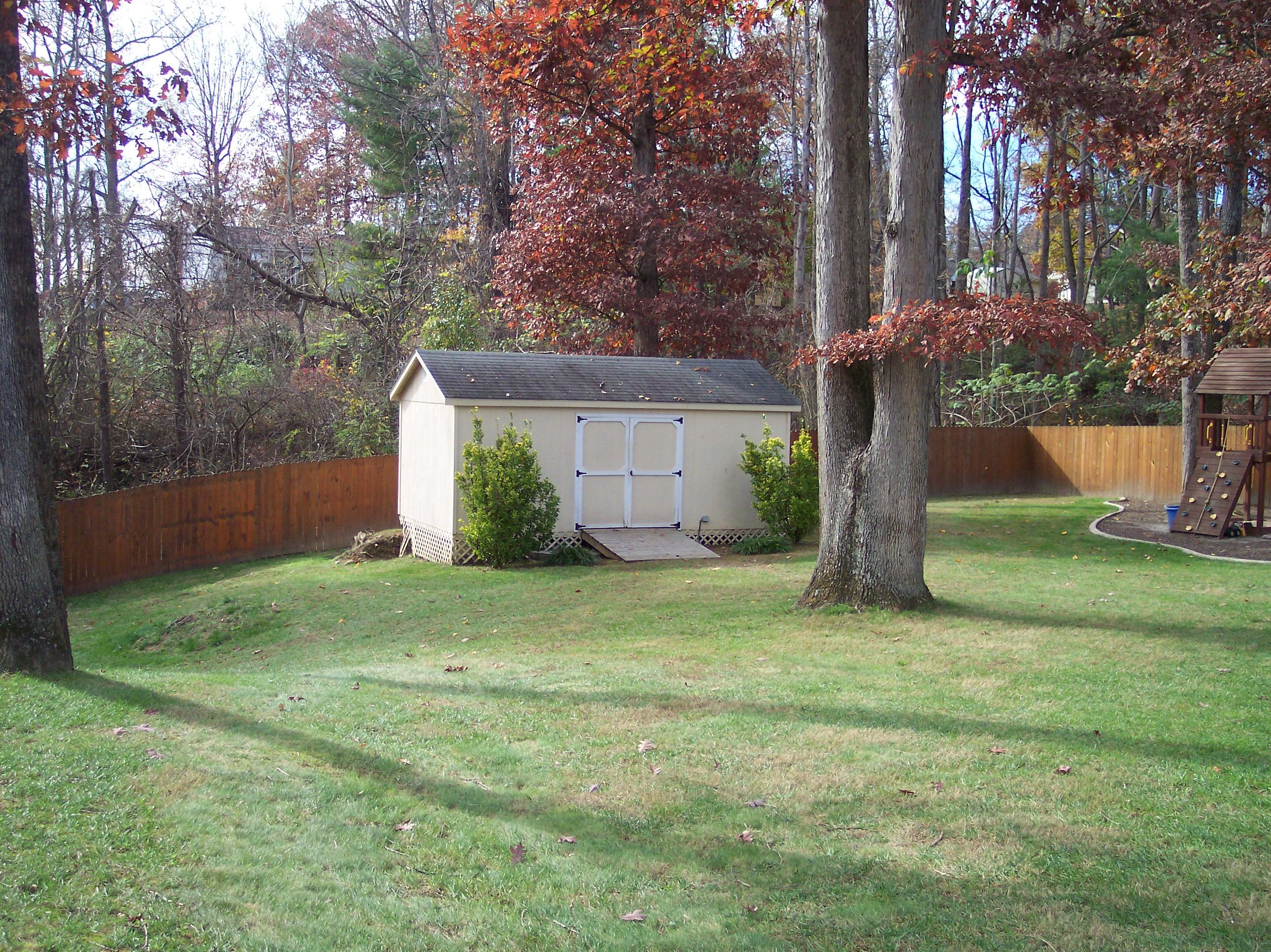 289 Scalybark Drive Blue Ridge, VA 24064 - Photo 69 of 73 a view of a backyard with a plants and large tree