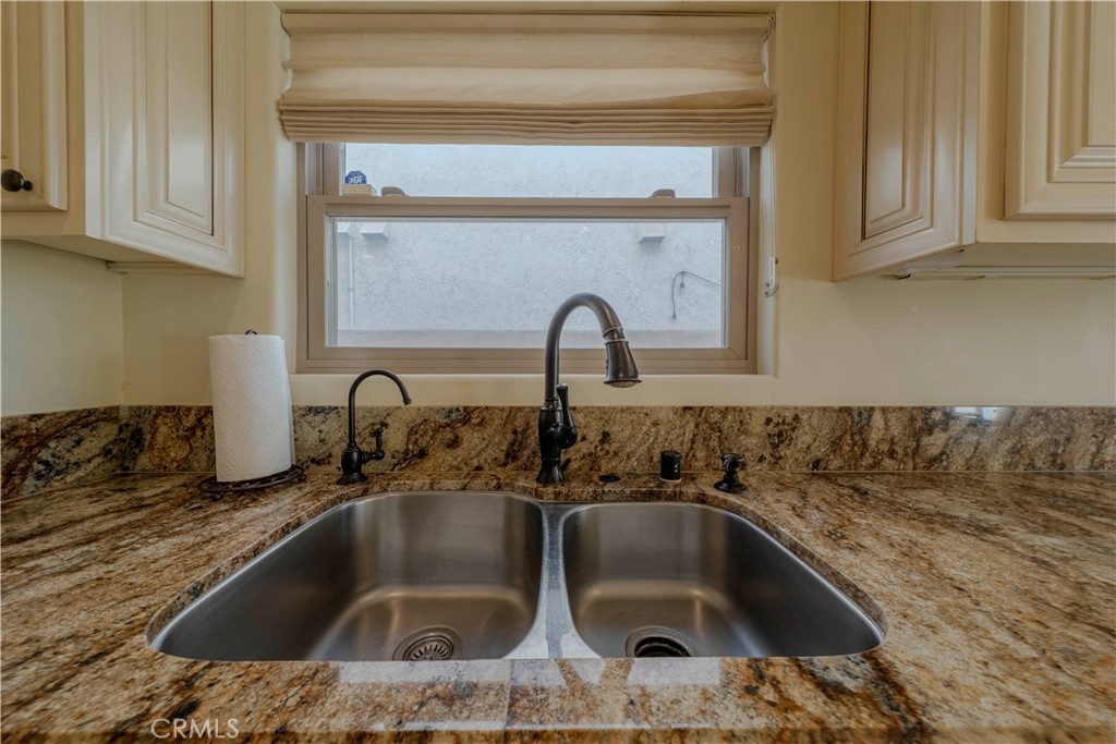 525 15th Street Huntington Beach, CA 92648 - Photo 20 of 46 a close view of sink and tap