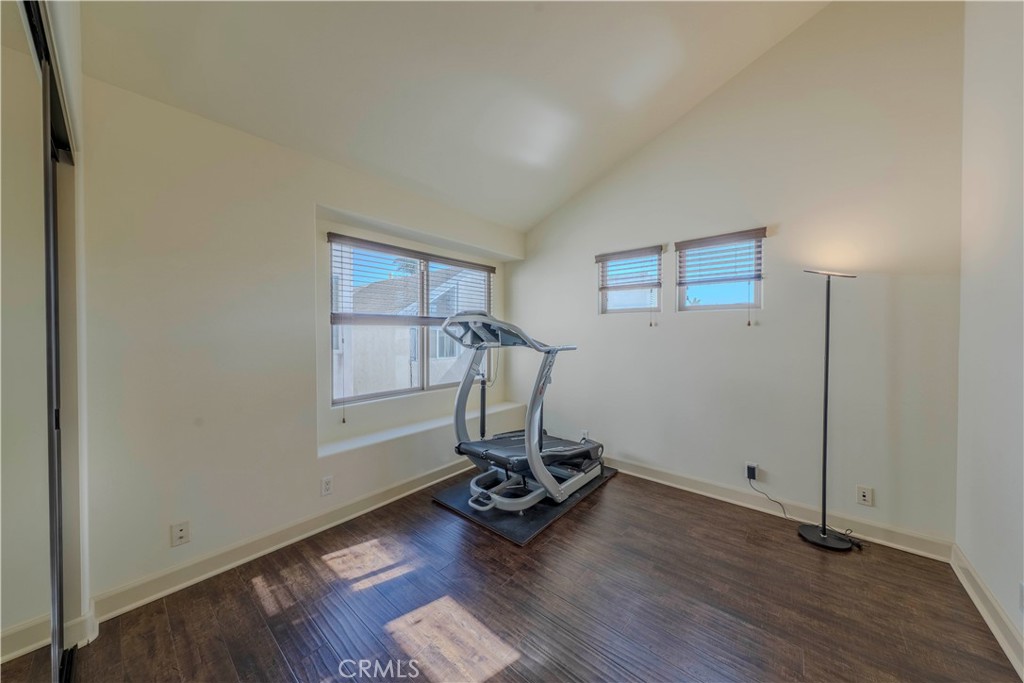 525 15th Street Huntington Beach, CA 92648 - Photo 29 of 46 a view of workspace with wooden floor table and windows