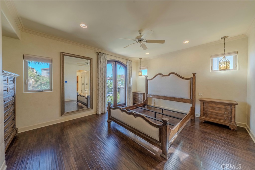 525 15th Street Huntington Beach, CA 92648 - Photo 32 of 46 a living room with furniture and wooden floor