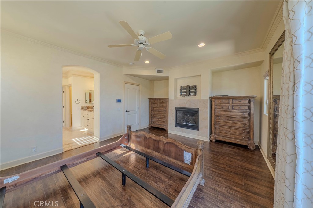 525 15th Street Huntington Beach, CA 92648 - Photo 33 of 46 a living room with furniture and a fireplace