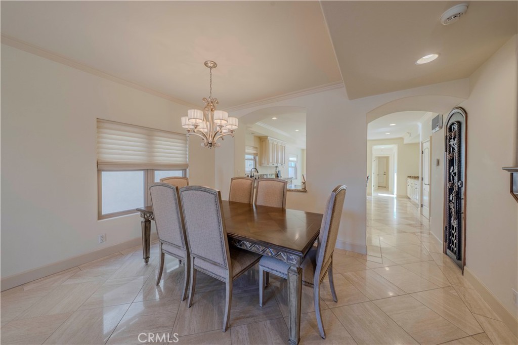 525 15th Street Huntington Beach, CA 92648 - Photo 10 of 46 a view of a dining room with furniture and window