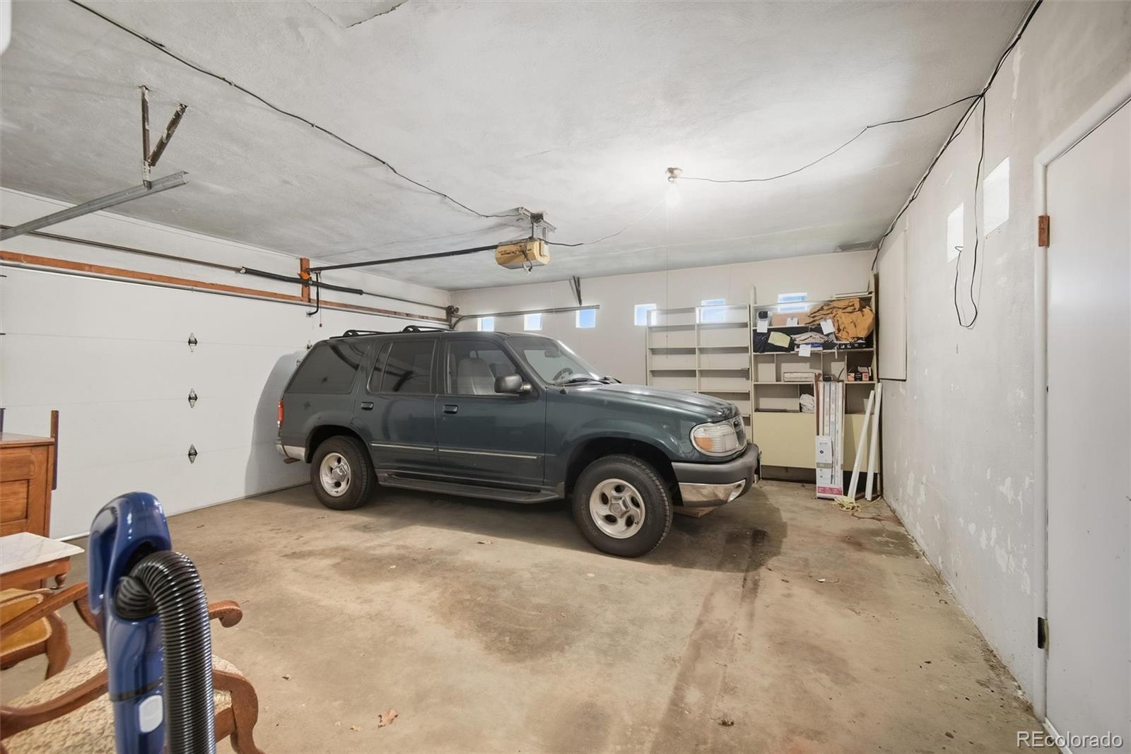 101 Hudson Street Denver, CO 80220 - Photo 22 of 27 a view of a car garage