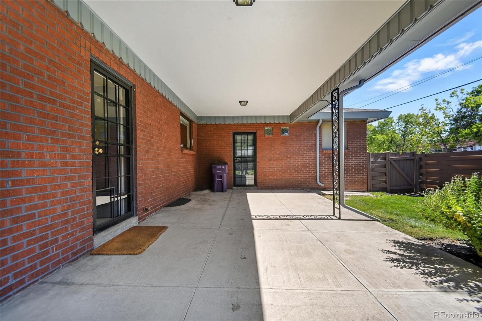 101 Hudson Street Denver, CO 80220 - Photo 23 of 27 a view of backyard with green space