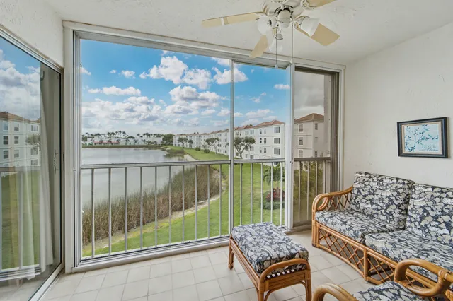a view of a lake from a balcony
