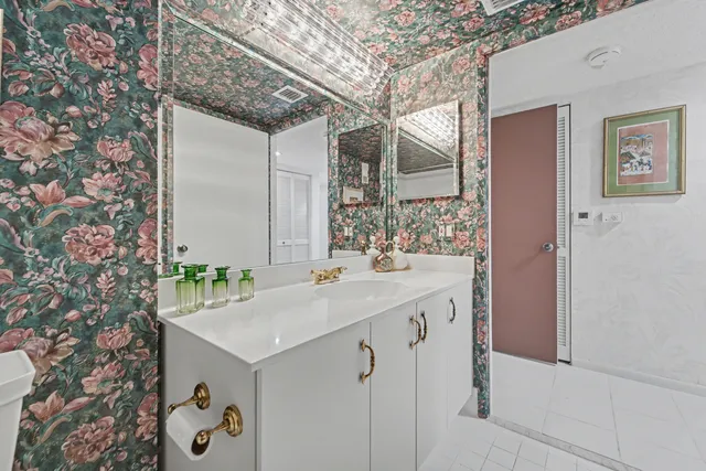 a living room with furniture and white walls