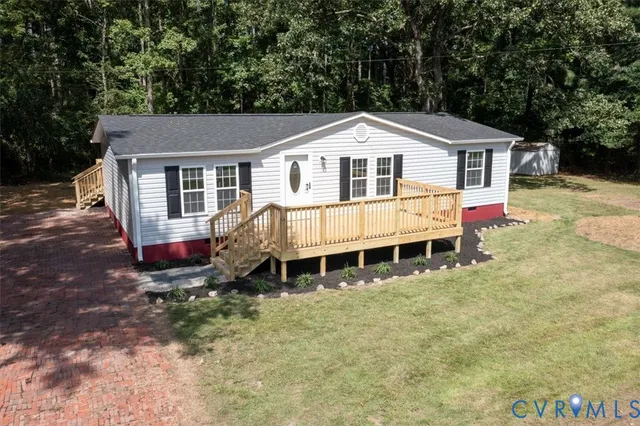 a front view of a house with yard