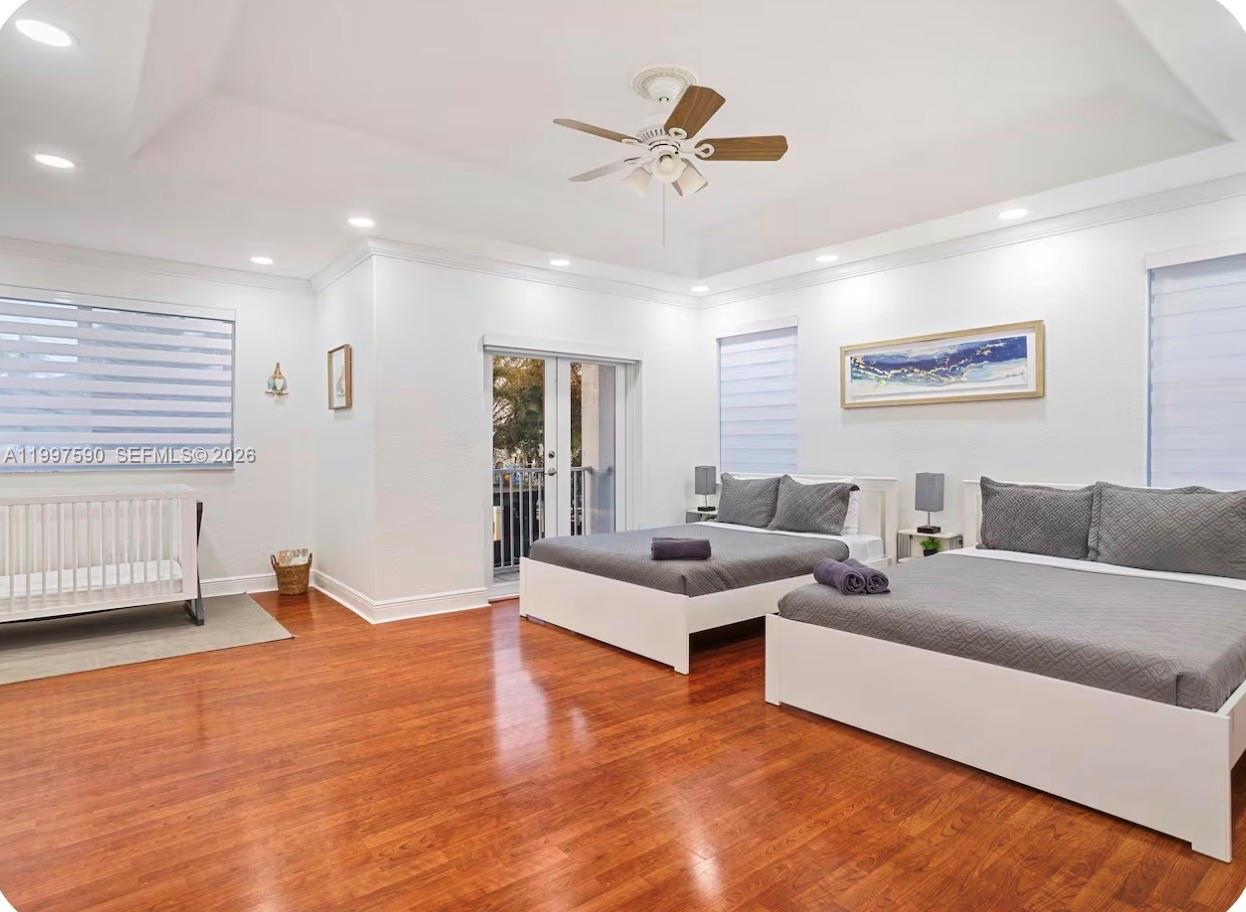 15411 Southwest 36th Terrace Miami, FL 33185 - Photo 14 of 45 a living room with furniture and a wooden floor