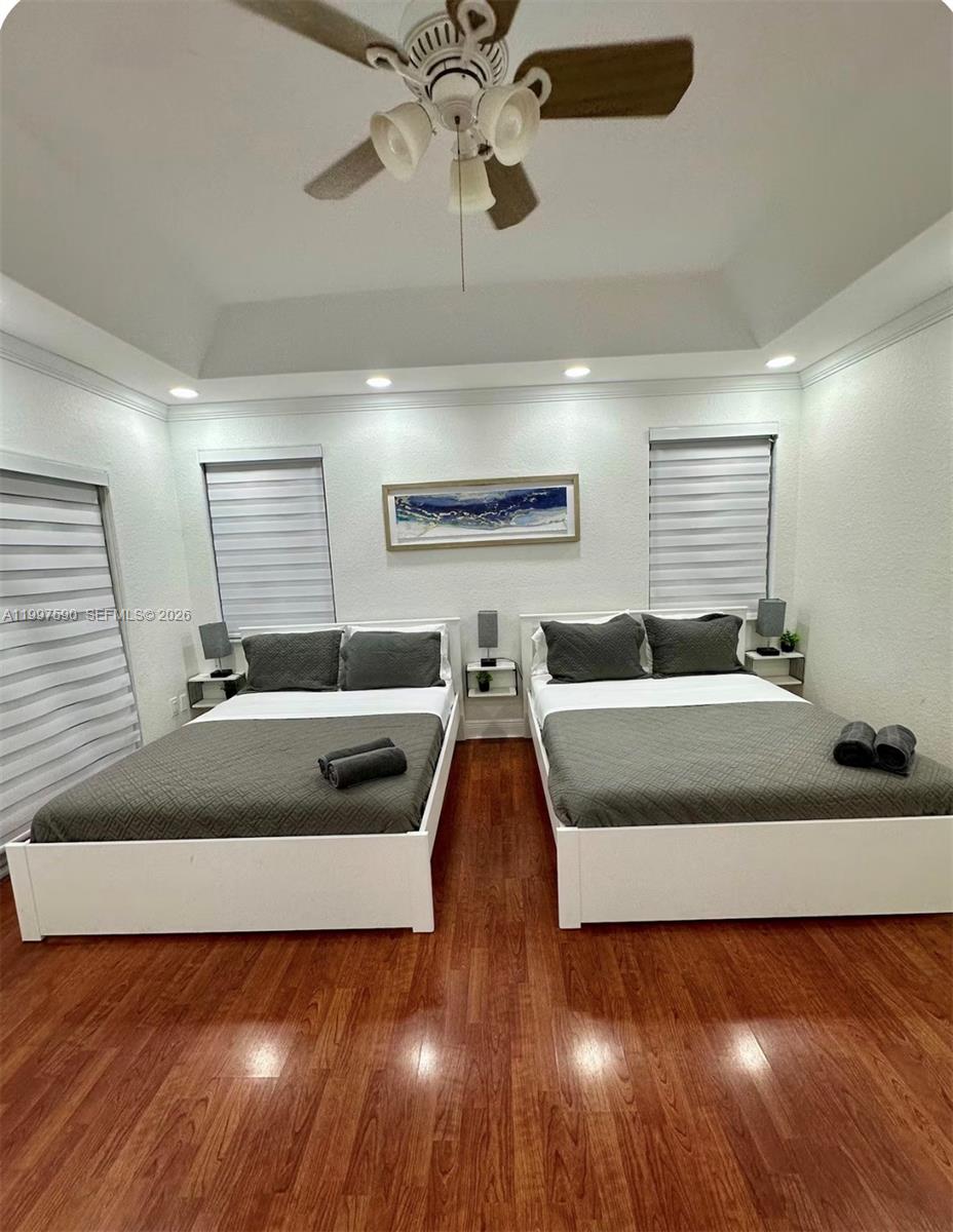 15411 Southwest 36th Terrace Miami, FL 33185 - Photo 16 of 45 a living room with furniture and a ceiling fan