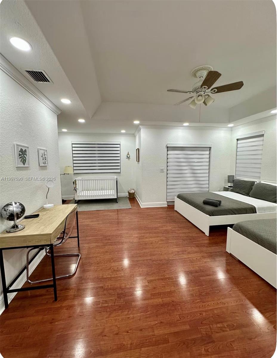 15411 Southwest 36th Terrace Miami, FL 33185 - Photo 17 of 45 a living room with furniture a air conditioner vent and a window