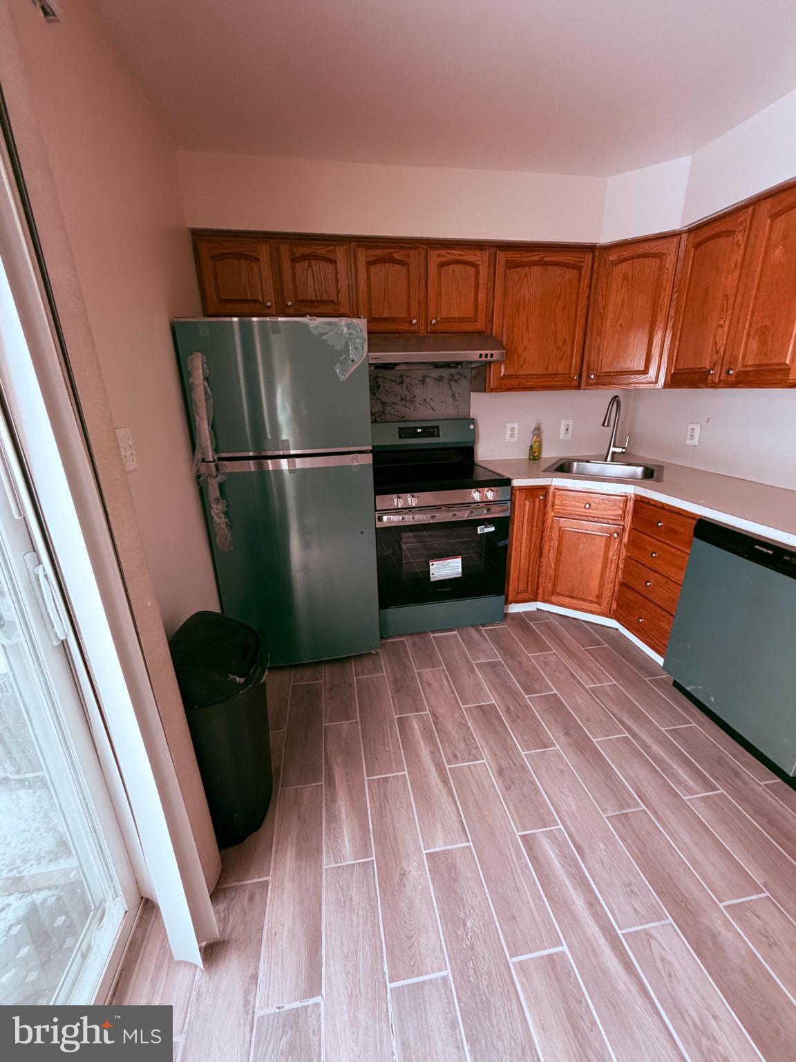 122 Annabelle Avenue Trenton, NJ 08610 - Photo 11 of 44 Modern kitchen with warm wood accents.