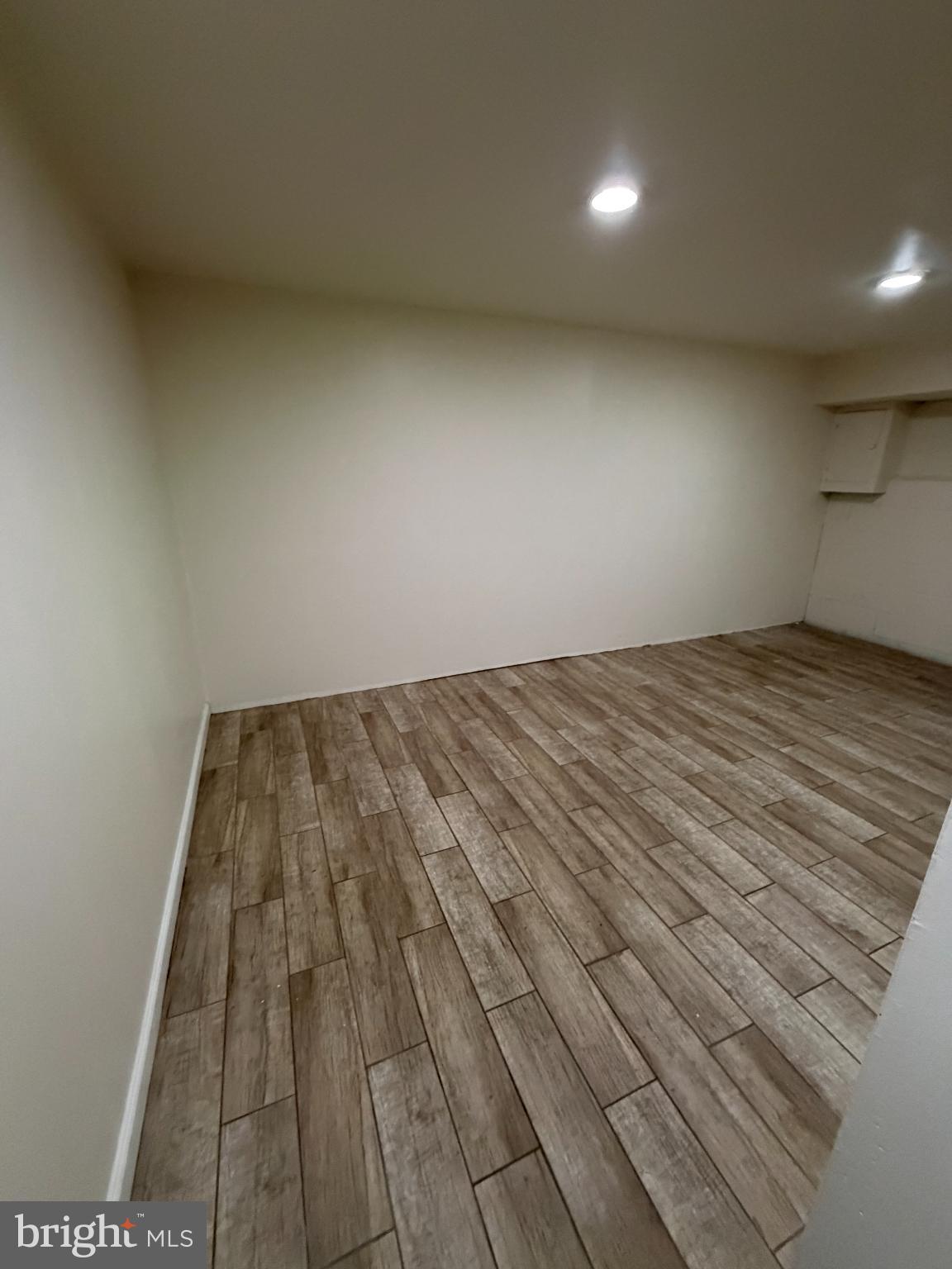 122 Annabelle Avenue Trenton, NJ 08610 - Photo 19 of 44 Spacious room with modern wood flooring.