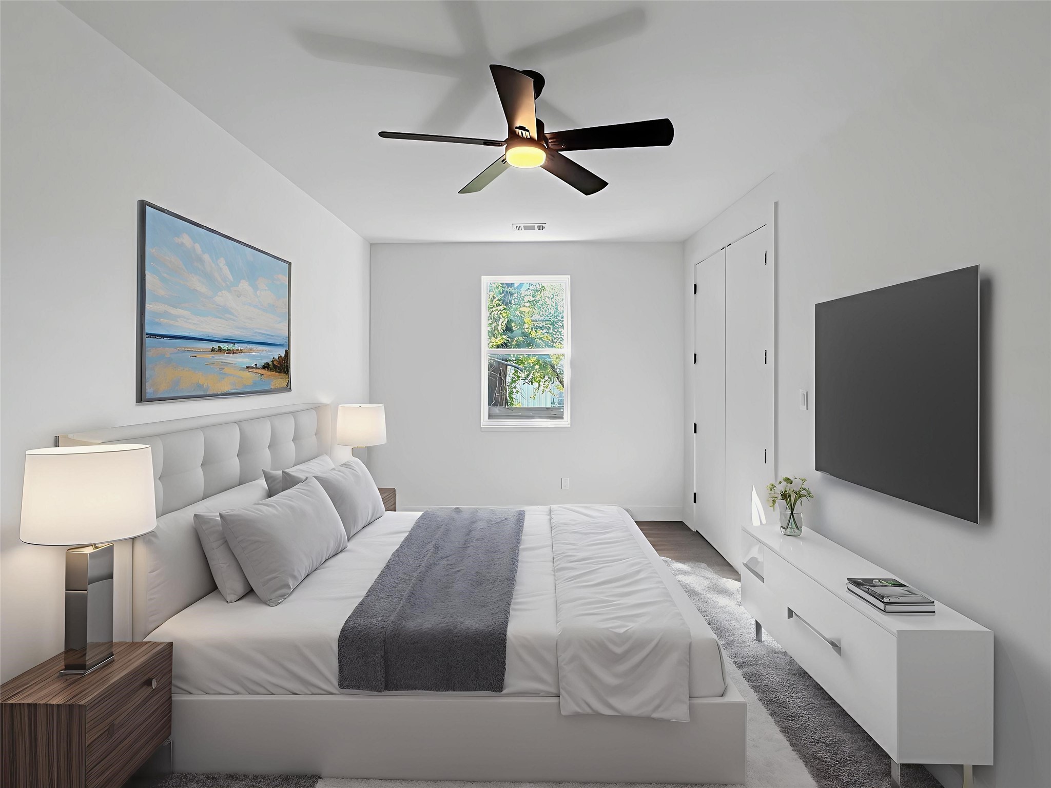 3115 Evella Street Houston, TX 77026 - Photo 4 of 21 a bedroom with a bed and a flat screen tv