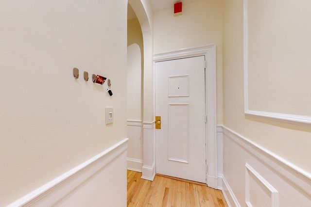 a bathroom with a bathtub and shower