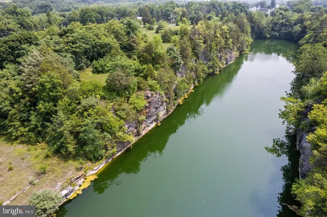 a view of a lake with a yard