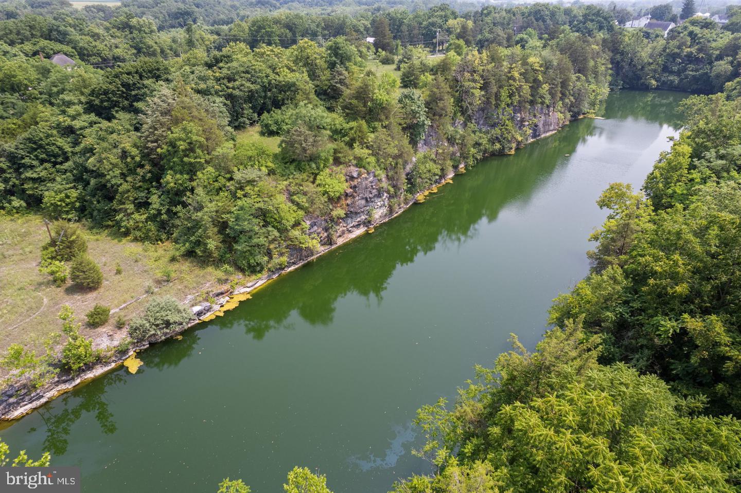 0 Warm Spring Road Greencastle, PA 17225 - Photo 12 of 12 a view of a lake with a house in the background