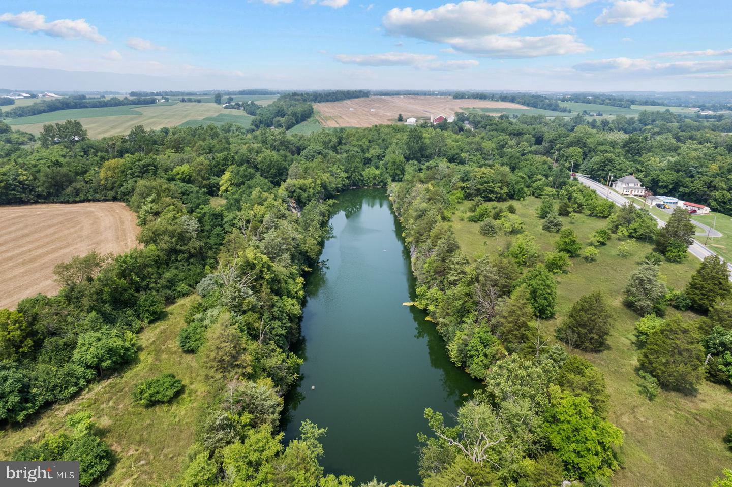 0 Warm Spring Road Greencastle, PA 17225 - Photo 5 of 12 an aerial view of a house with a yard and large trees all around