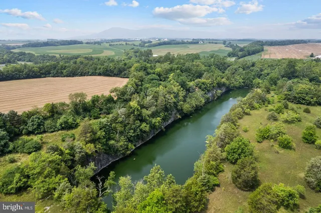 a view of lake with green space