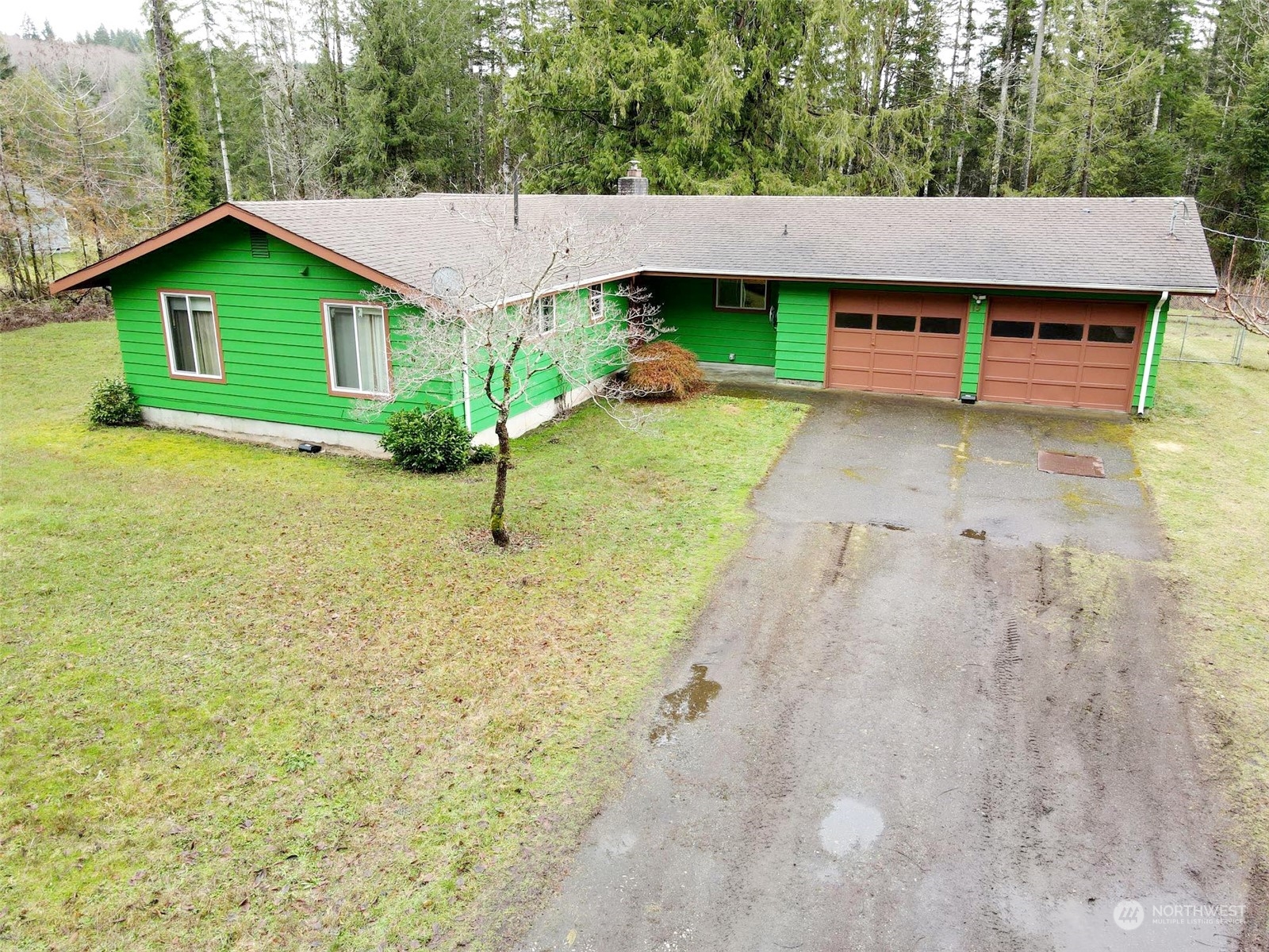 15 Foreman Road McCleary, WA 98557 - Photo 1 of 31 a front view of a house with a garden