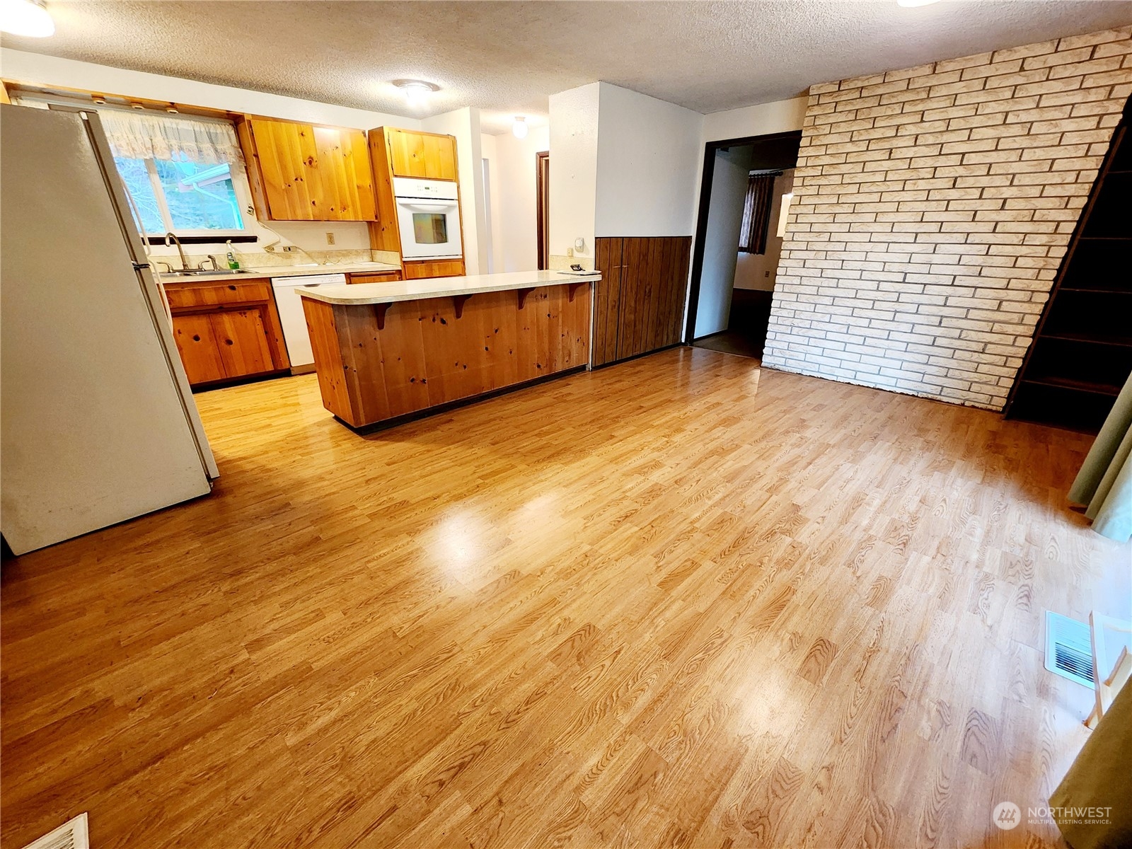 15 Foreman Road McCleary, WA 98557 - Photo 8 of 31 a view of kitchen with sink and wooden floor
