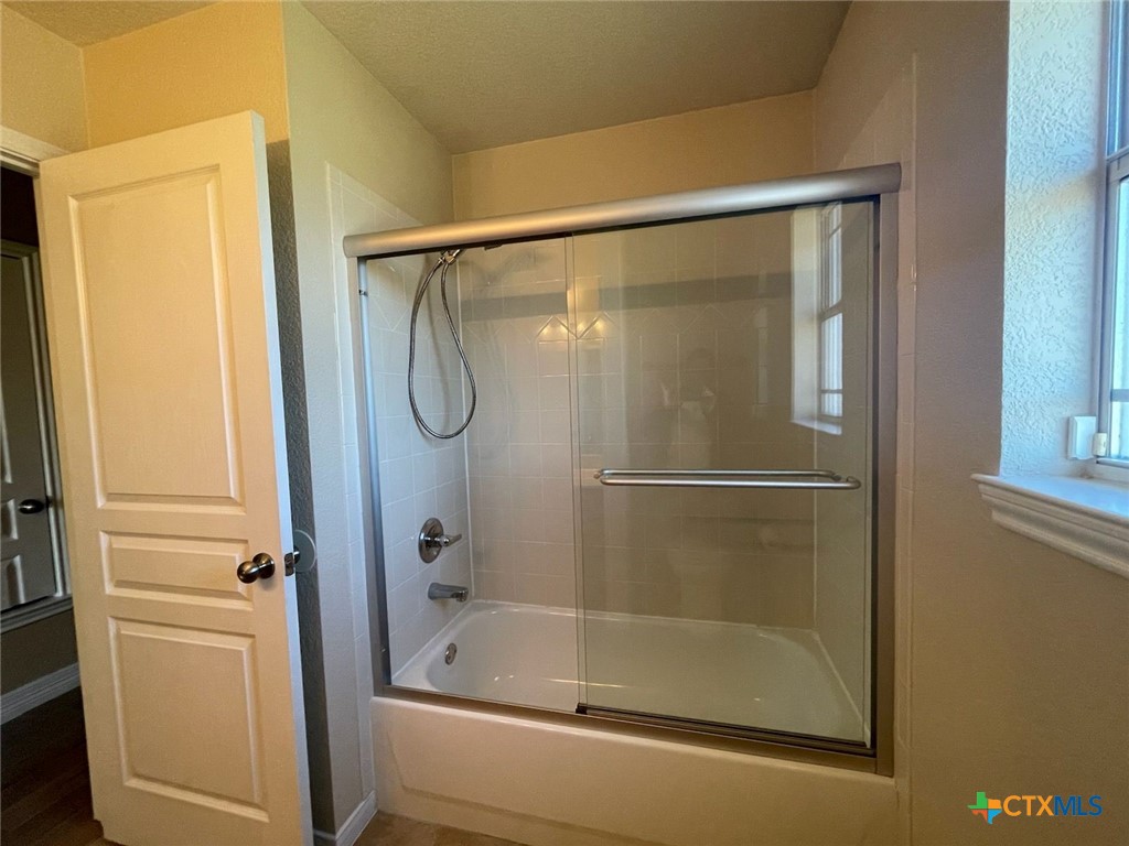 170 County Road 4709 Kempner, TX 76539 - Photo 19 of 24 Shower / Tub combo with glass doors
Texas Real Estate Sales, Leah Caruthers