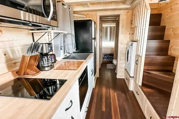 a view of kitchen island with wooden floor