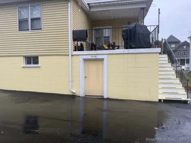 a view of a kitchen with wooden floor