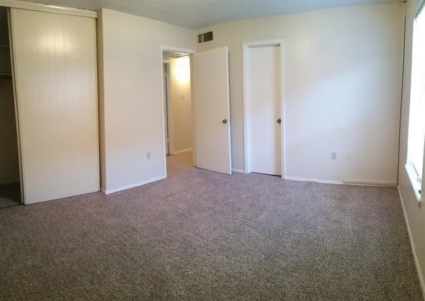 a utility room with cabinets