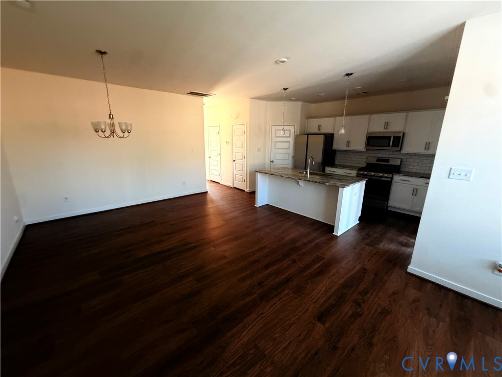 12737 Deep Wl Road Midlothian, VA 23112 - Photo 4 of 17 a living room with furniture and wooden floor