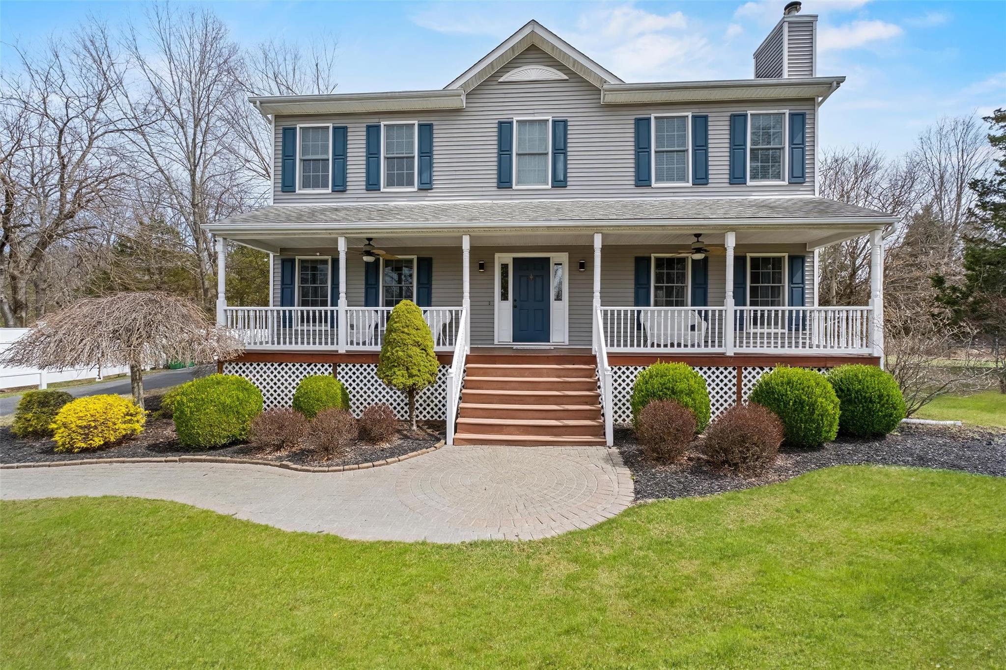 54 Sleight-Plass Road Poughkeepsie, NY 12603 - Photo 1 of 1 a front view of a house with a garden and plants