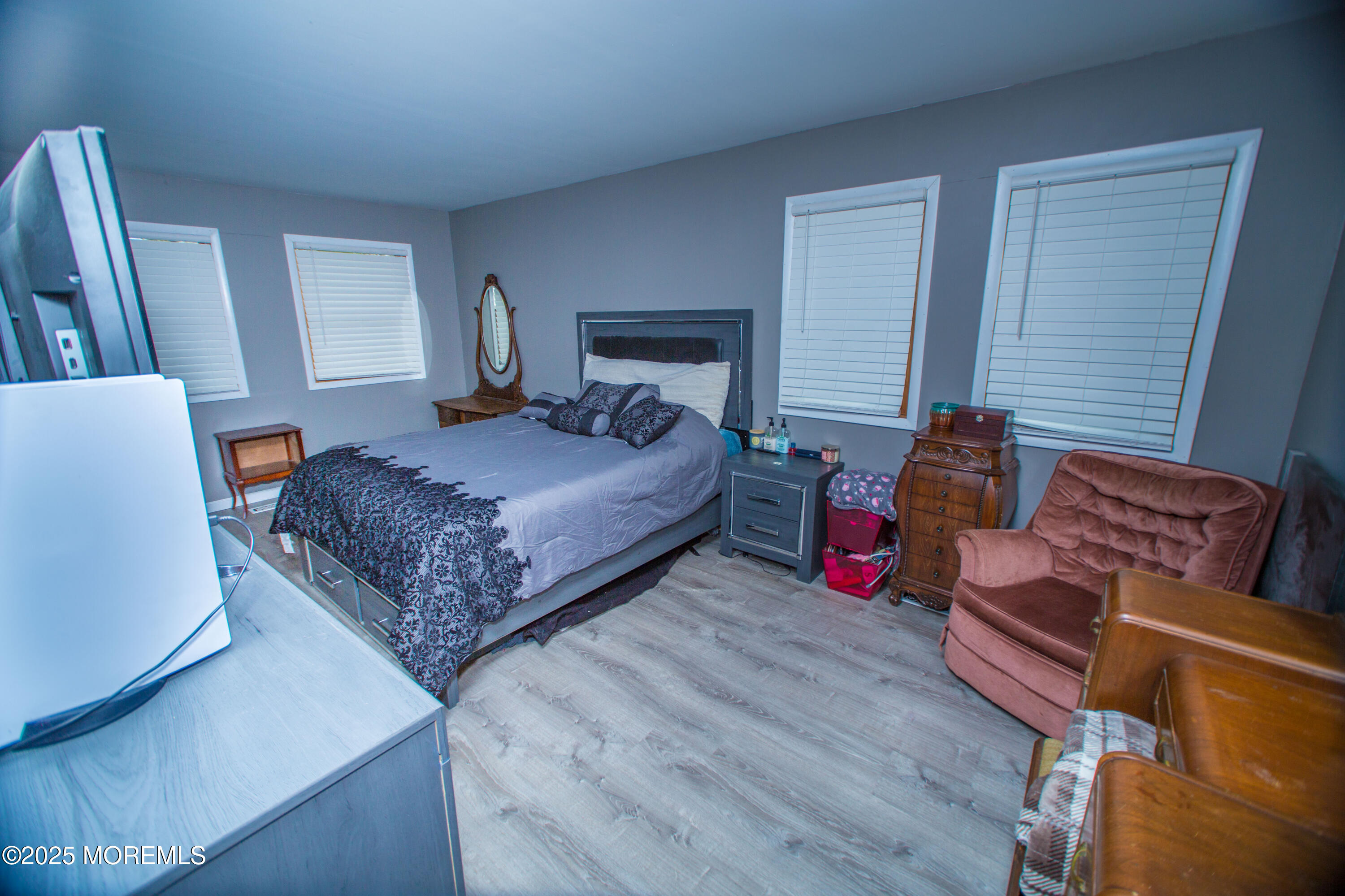 21 Birmingham Drive Jackson, NJ 08527 - Photo 14 of 27 a bedroom with bed and a couch