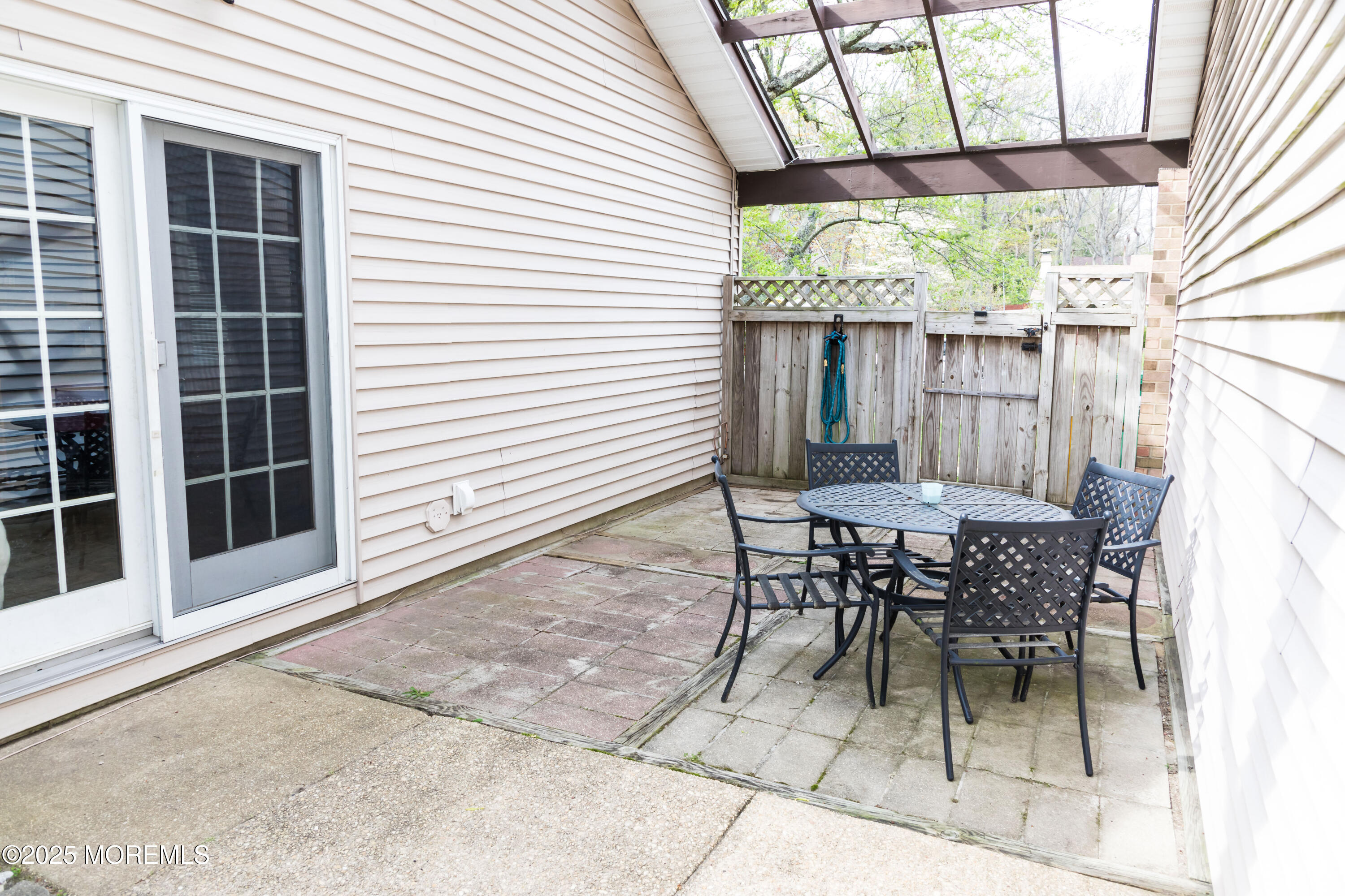 21 Birmingham Drive Jackson, NJ 08527 - Photo 24 of 27 a view of a house with a porch and furniture