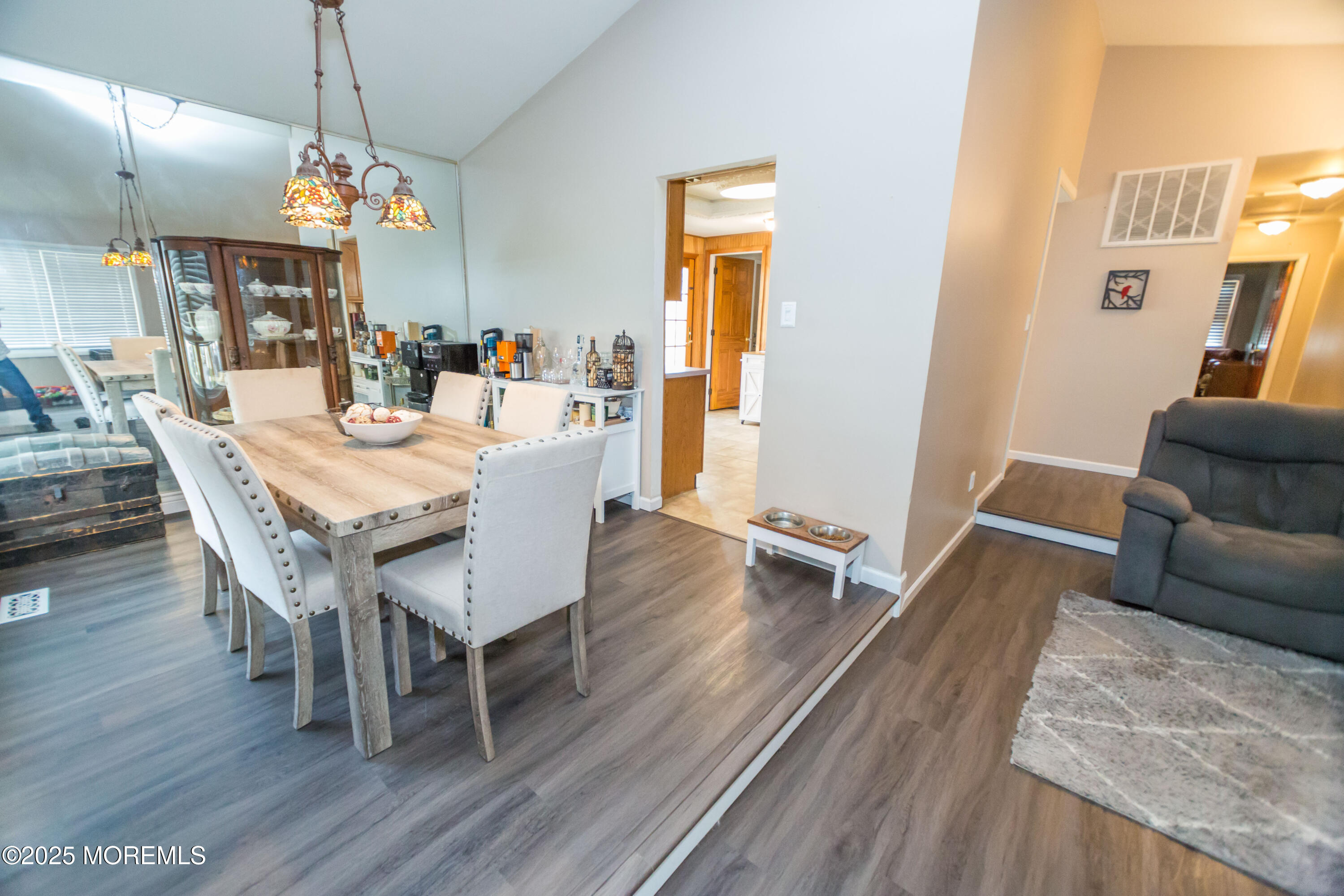 21 Birmingham Drive Jackson, NJ 08527 - Photo 7 of 27 a view of a dining room with furniture and wooden floor