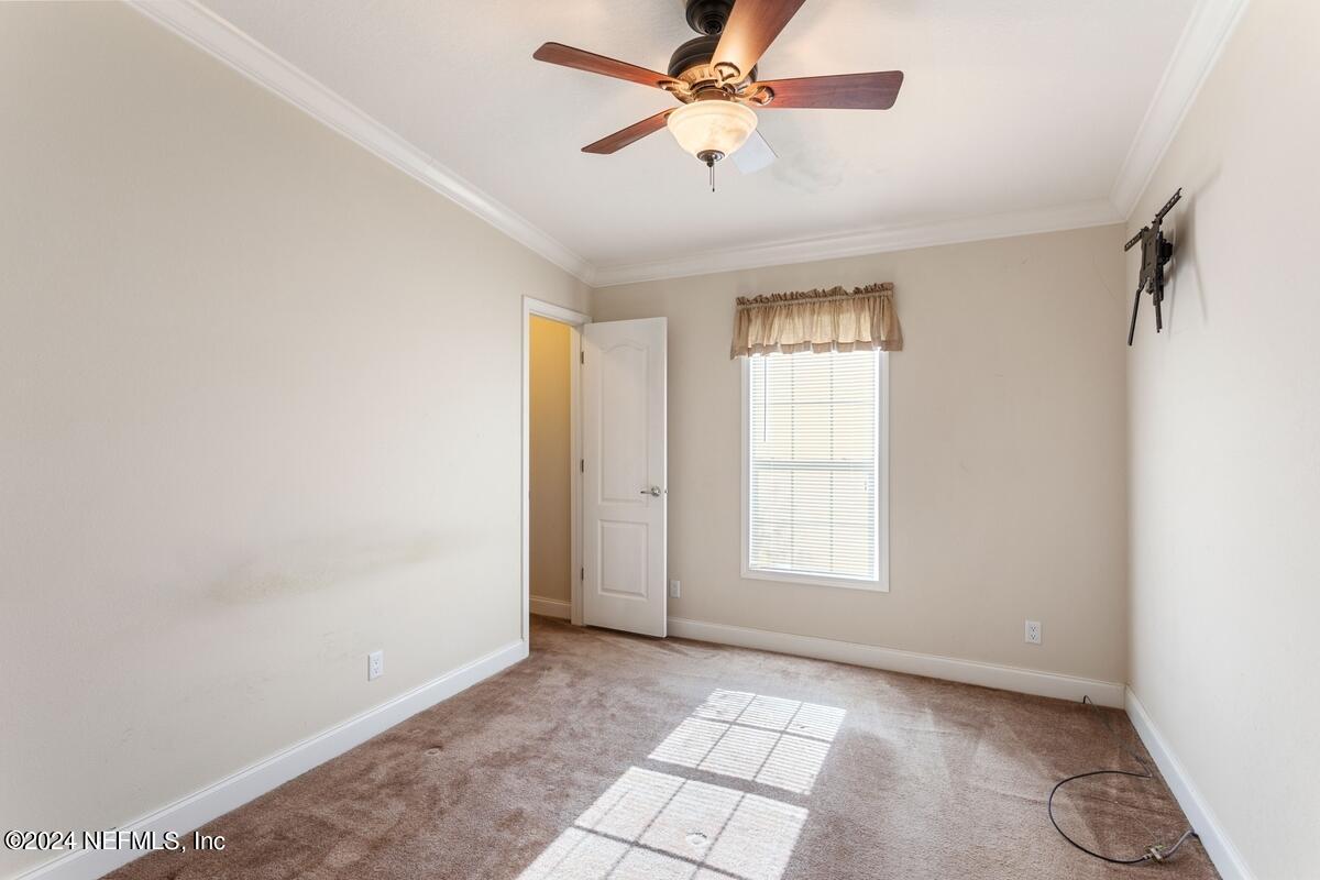 175 Hawk Lane Hastings, FL 32145 - Photo 14 of 40 a view of an empty room with a window