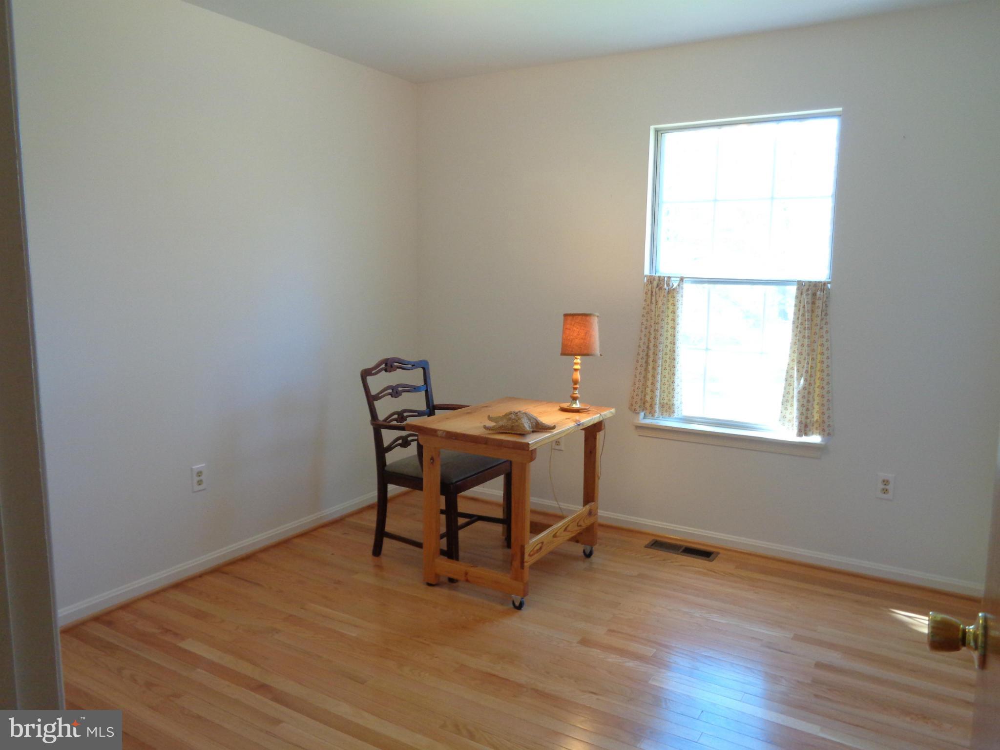 2000 Kings Landing Road Huntingtown, MD 20639 - Photo 11 of 24 a workspace with furniture and a window