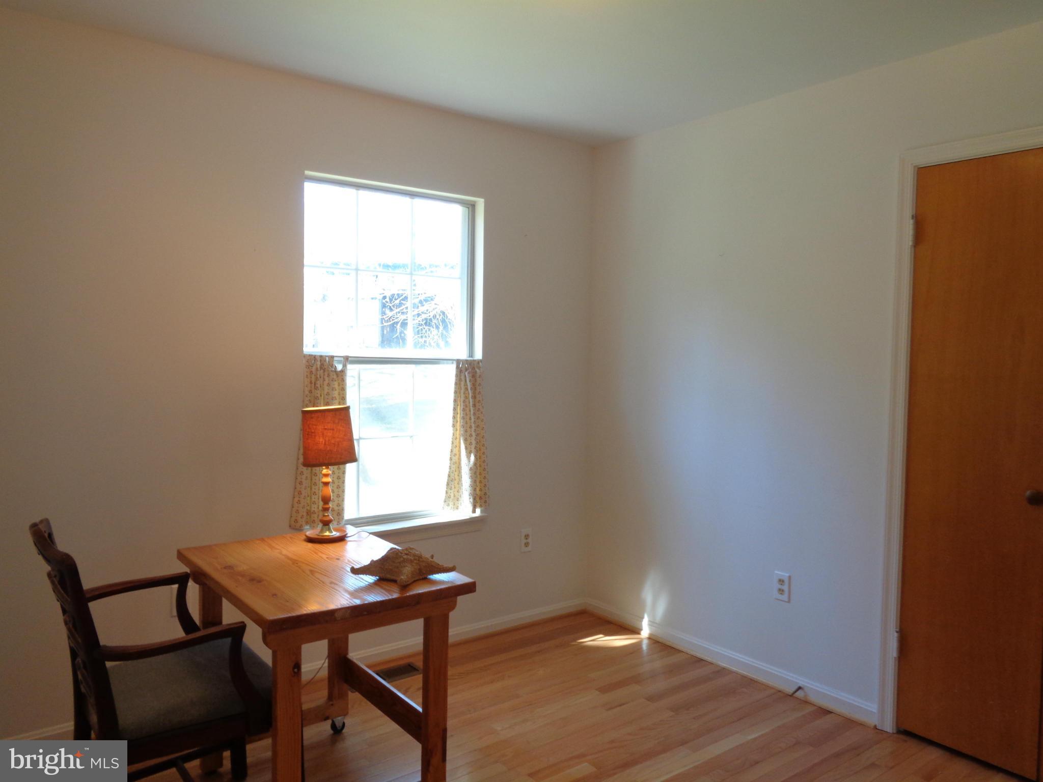 2000 Kings Landing Road Huntingtown, MD 20639 - Photo 12 of 24 a view of a workspace with furniture and window