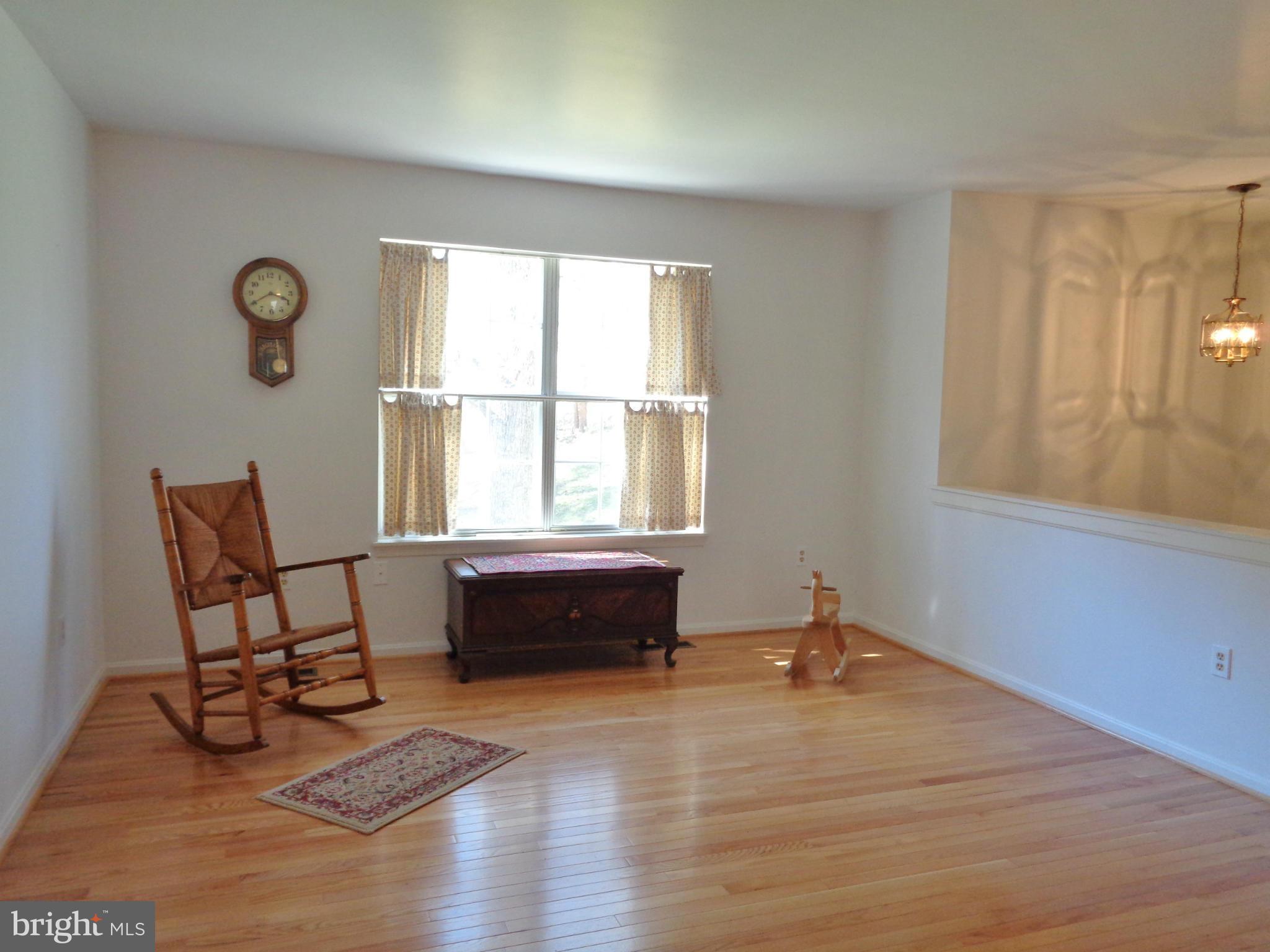2000 Kings Landing Road Huntingtown, MD 20639 - Photo 4 of 24 a living room with furniture window and wooden floor