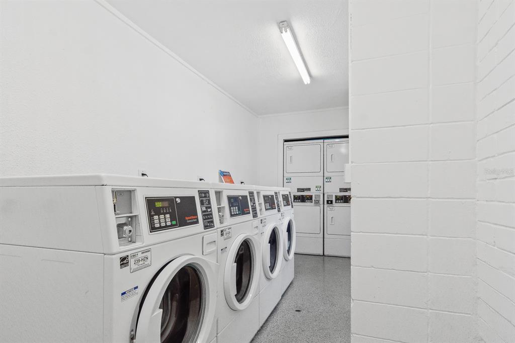 1700 Southwest 16th Court, Unit L26 Gainesville, FL 32608 - Photo 18 of 24 a utility room with dryer and washer