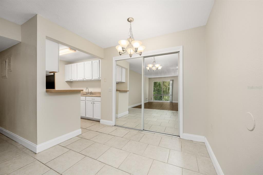 1700 Southwest 16th Court, Unit L26 Gainesville, FL 32608 - Photo 9 of 24 a view of a kitchen with a sink and dishwasher kitchen view