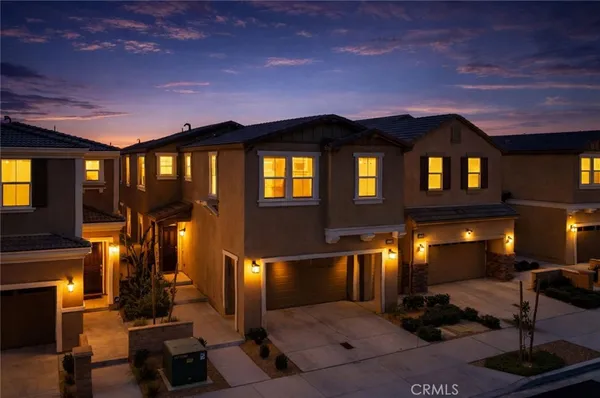a front view of a house with entertaining space