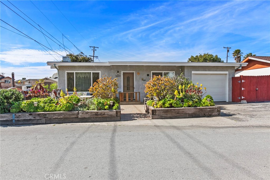 front view of a house with a street