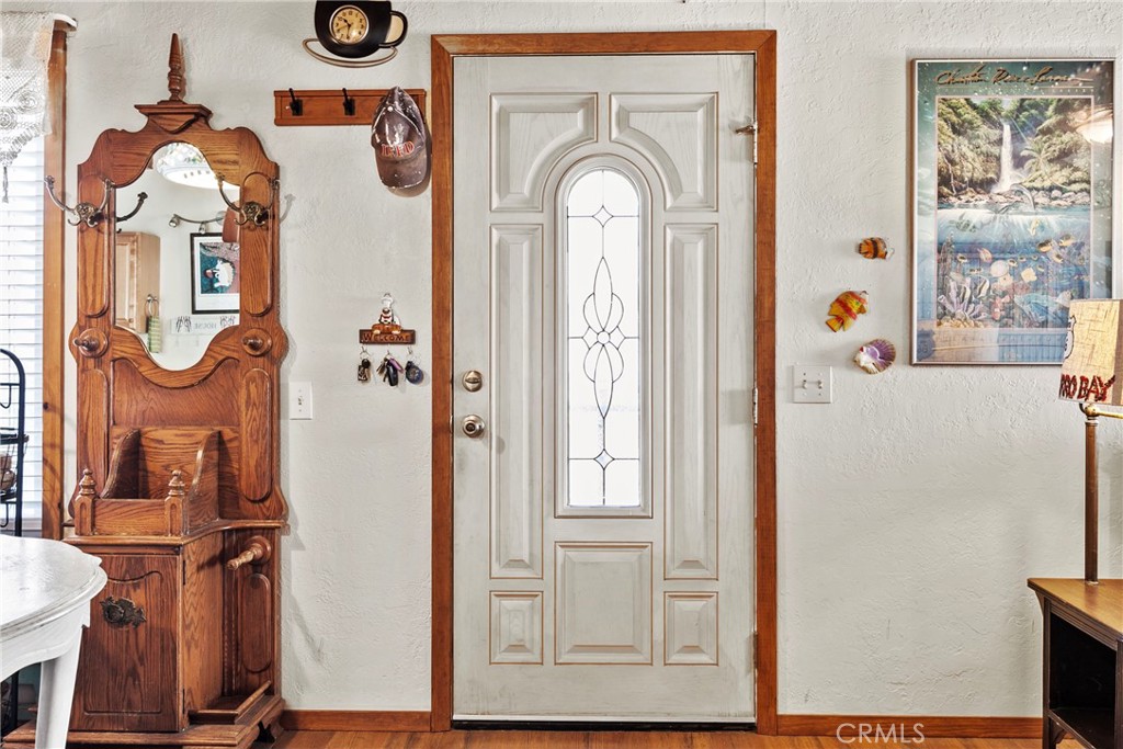 3201 Tide Avenue Morro Bay, CA 93442 - Photo 11 of 30 a front view of a house with entryway wooden floor and front door